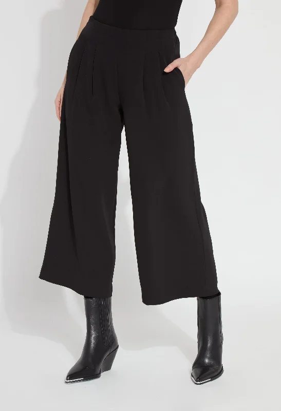 Distressed jeans with bleach spots for a unique appearanceGiselle Pleated Coulotte Pant