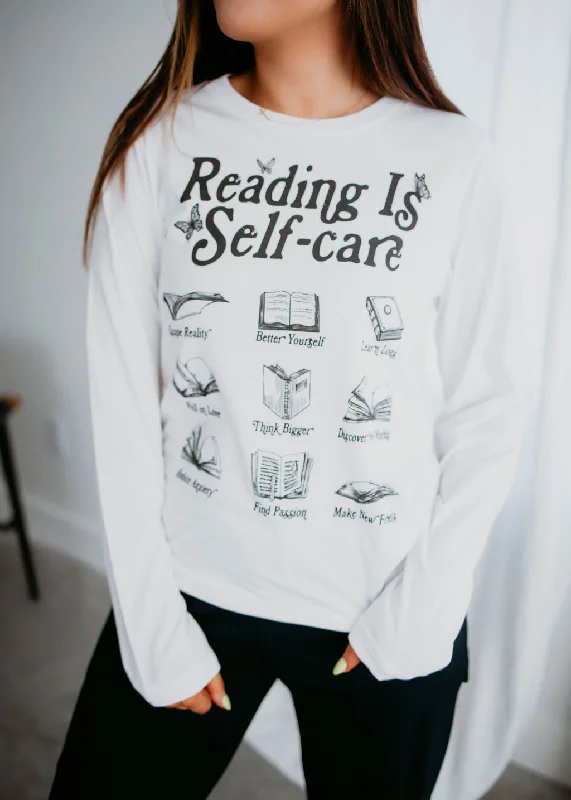 Animal print women's topsReading is Self Care Long Sleeve Top